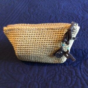 The Sak crocheted cosmetic bag